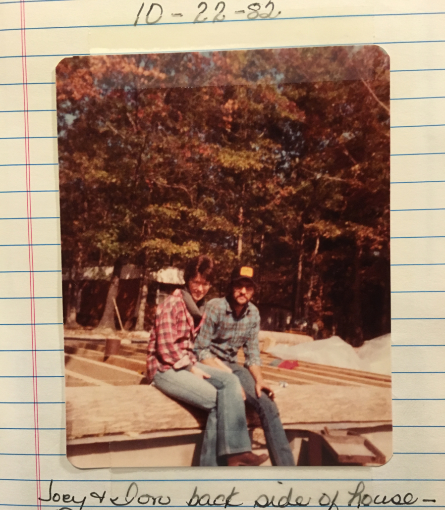 sitting on the cabin under construction